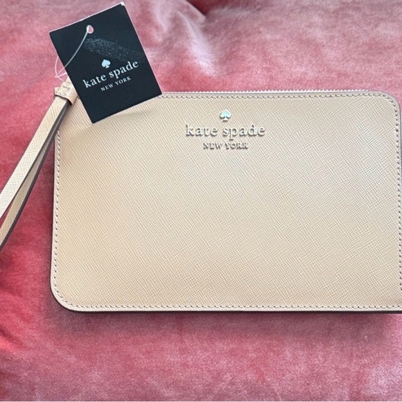 kate spade Handbags - Kate Spade Tan Wristlet